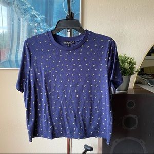 Navy blue tee with moon and star pattern